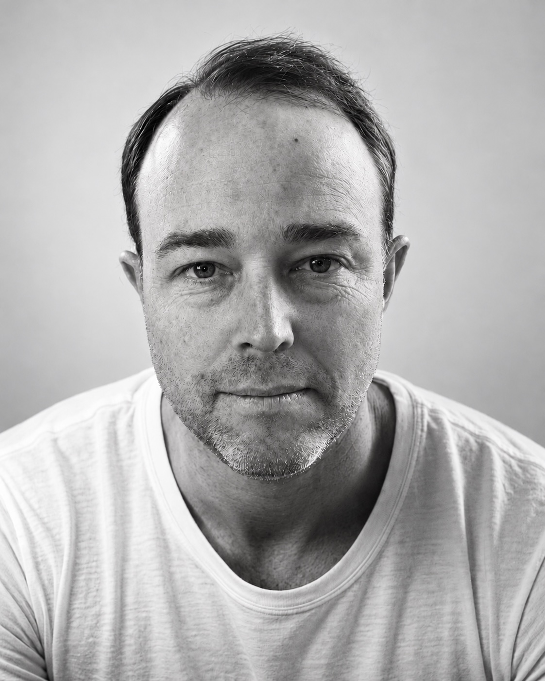 Black-and-white portrait of Anthony Furlong