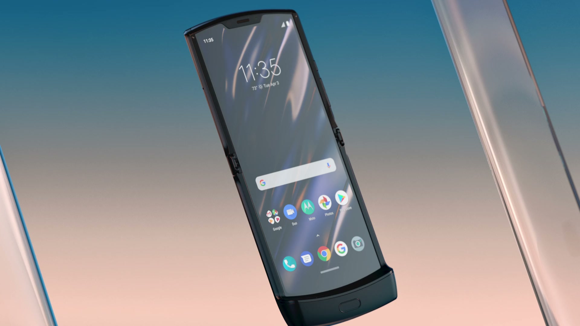 The foldable Motorola Razr displayed open in a reflective architectural setting in the launch film.